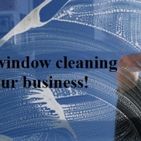 window cleaning business banner person cleaning window with a squeegee